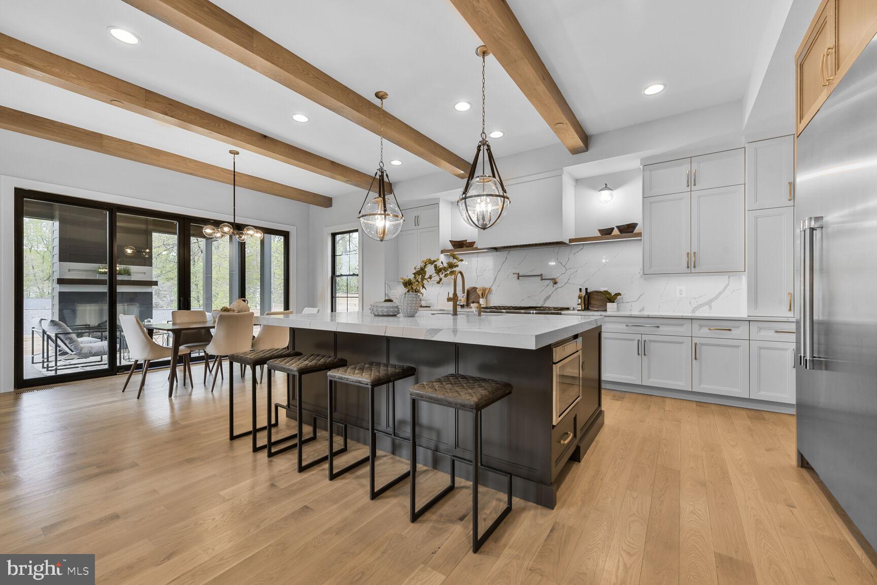 7200 Millwood Road Bethesda, MD 20817 - Photo 3 of 9 Expansive Island, and Wooden Beams