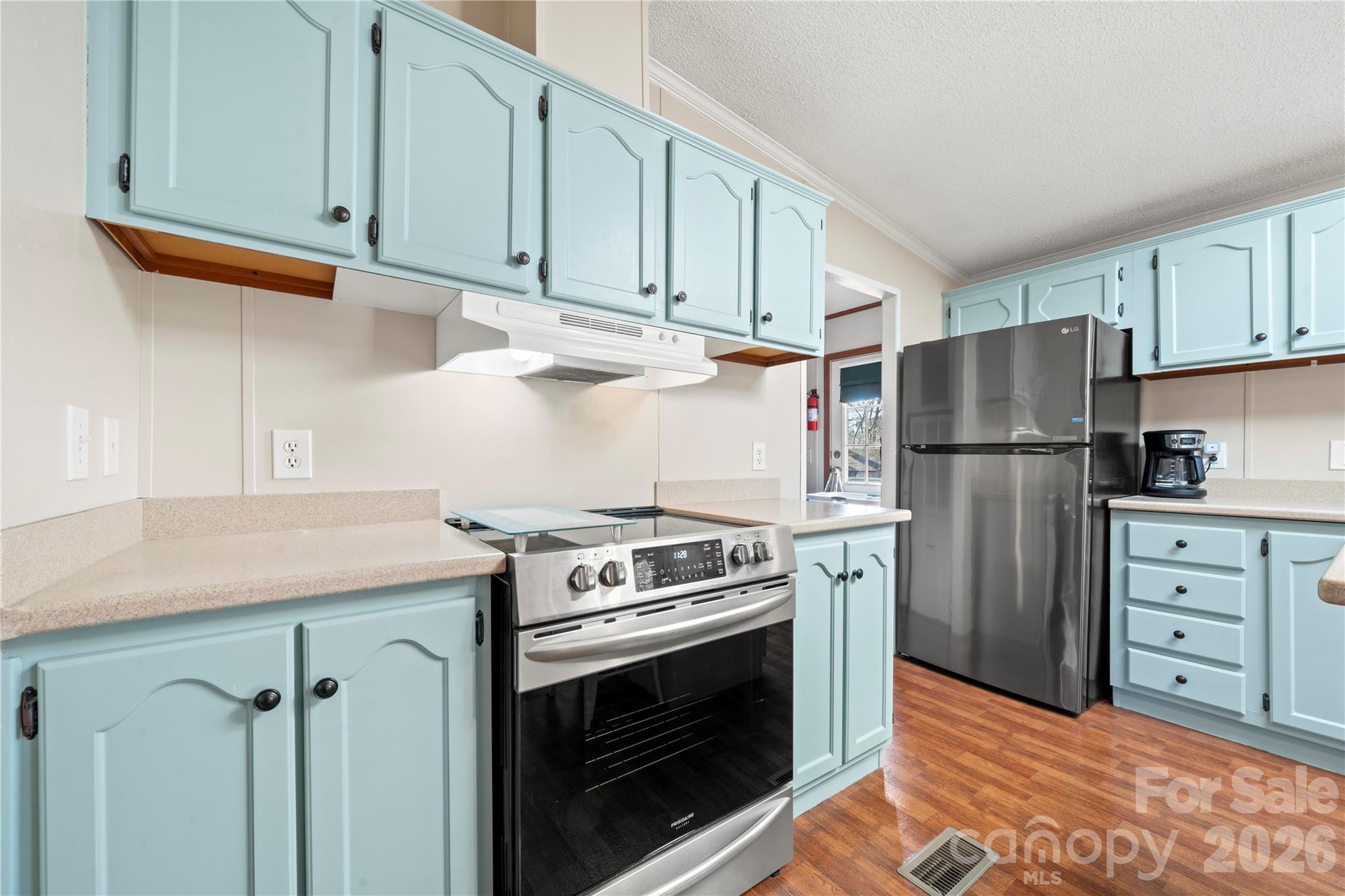 230 Valley View Drive Clover, SC 29710 - Photo 21 of 42 a kitchen with refrigerator stove and cabinets