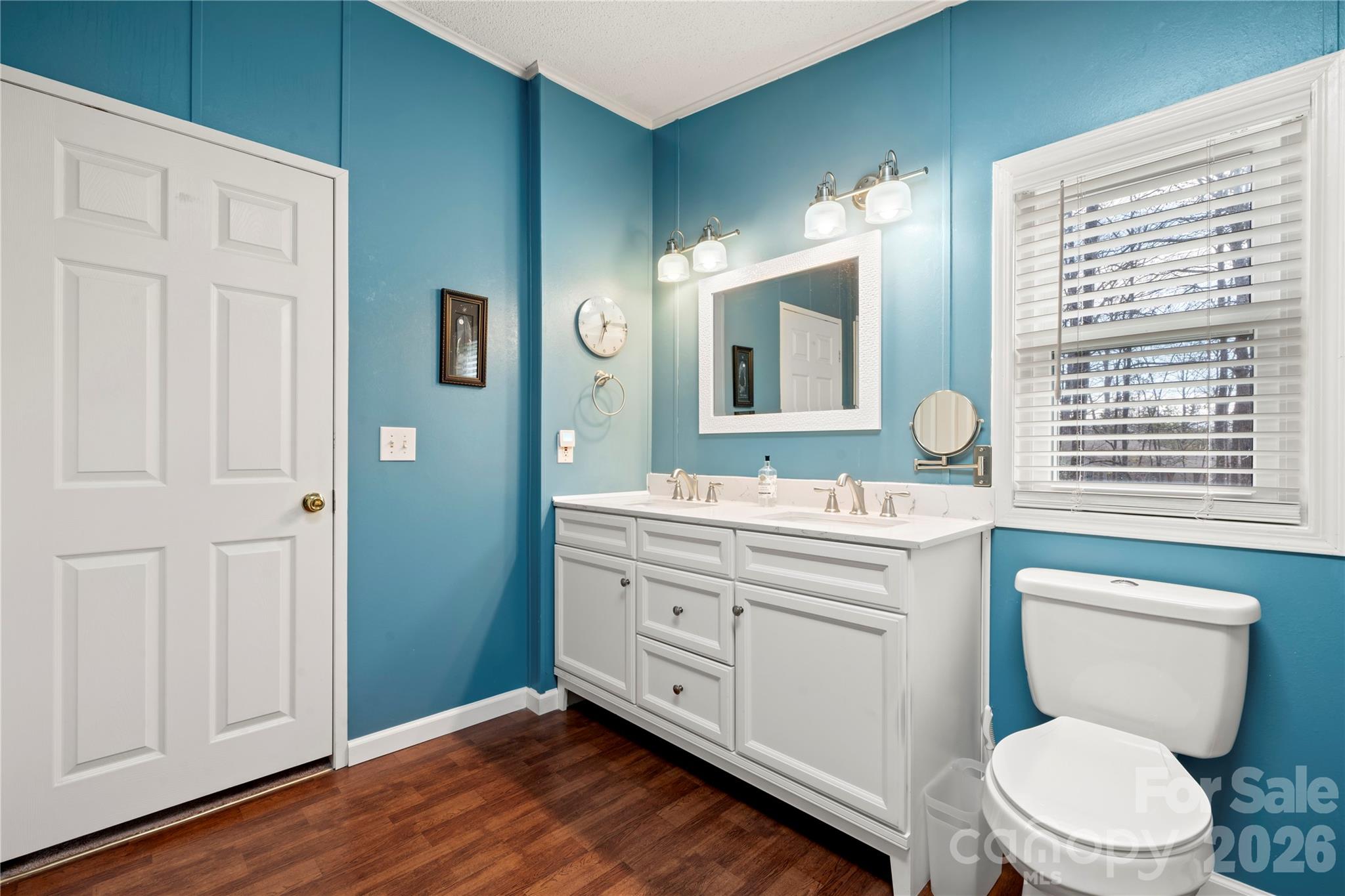 230 Valley View Drive Clover, SC 29710 - Photo 28 of 42 a bathroom with a granite countertop toilet sink and mirror