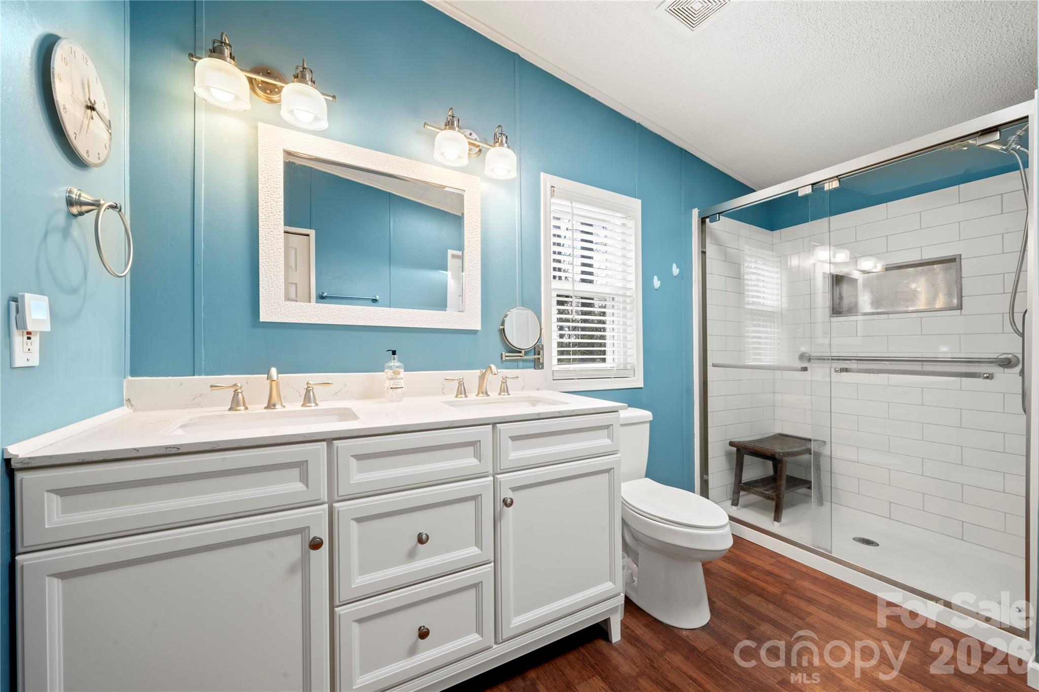 230 Valley View Drive Clover, SC 29710 - Photo 29 of 42 a bathroom with a sink a toilet and a mirror