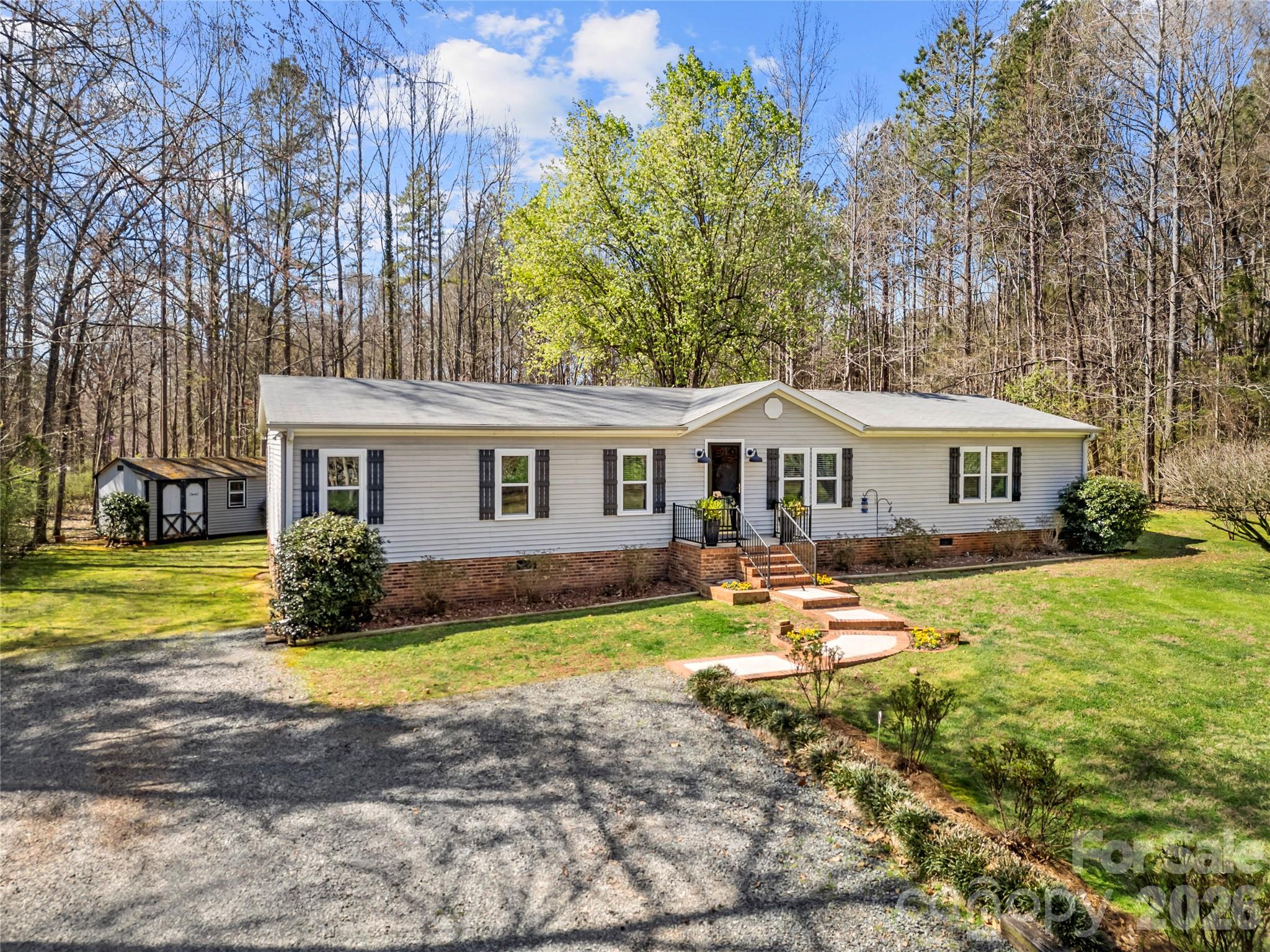 230 Valley View Drive Clover, SC 29710 - Photo 3 of 42 a view of a house with backyard and sitting area