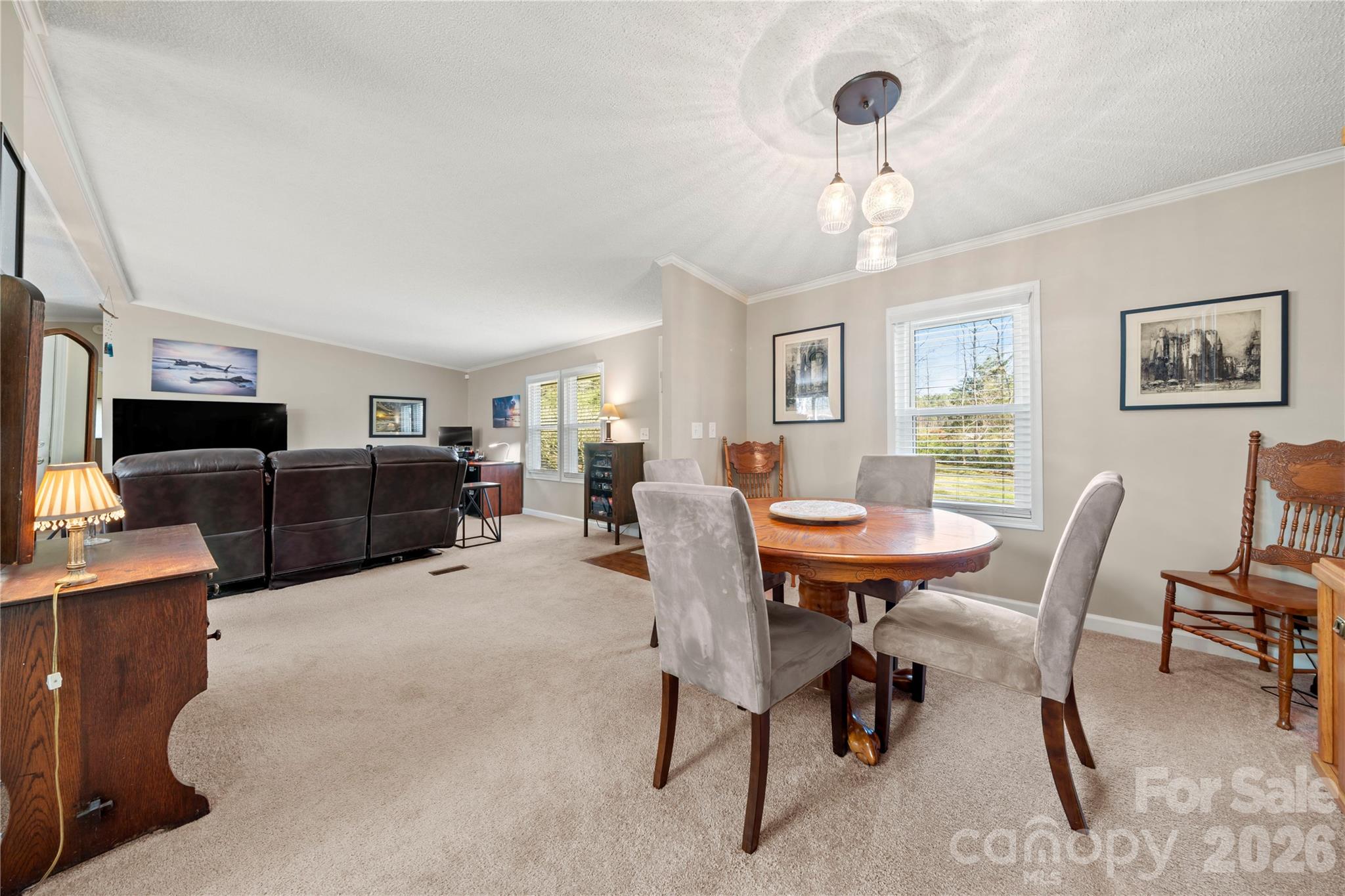 230 Valley View Drive Clover, SC 29710 - Photo 10 of 42 a view of a dining room with furniture and a chandelier