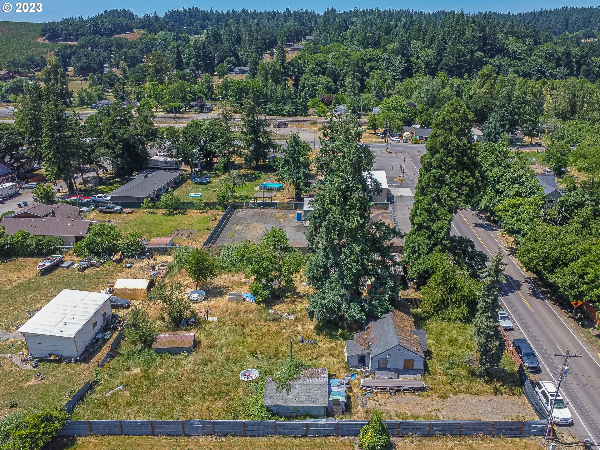 5918 Stayton Road Southeast Turner, OR 97392 - Photo 3 of 9 an aerial view of residential houses with outdoor space and parking