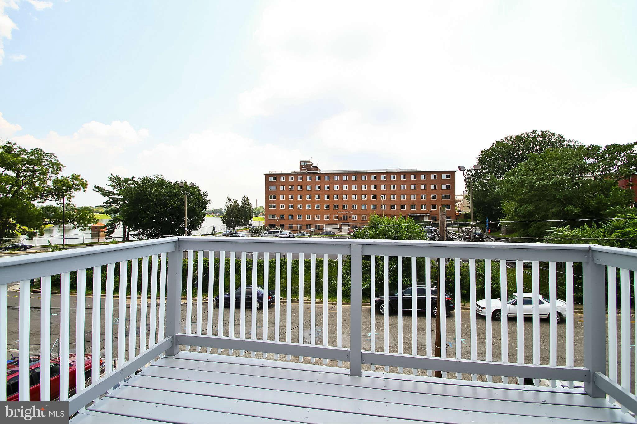 604 Columbia Road Northwest Washington, DC 20001 - Photo 13 of 25 a view of a roof deck