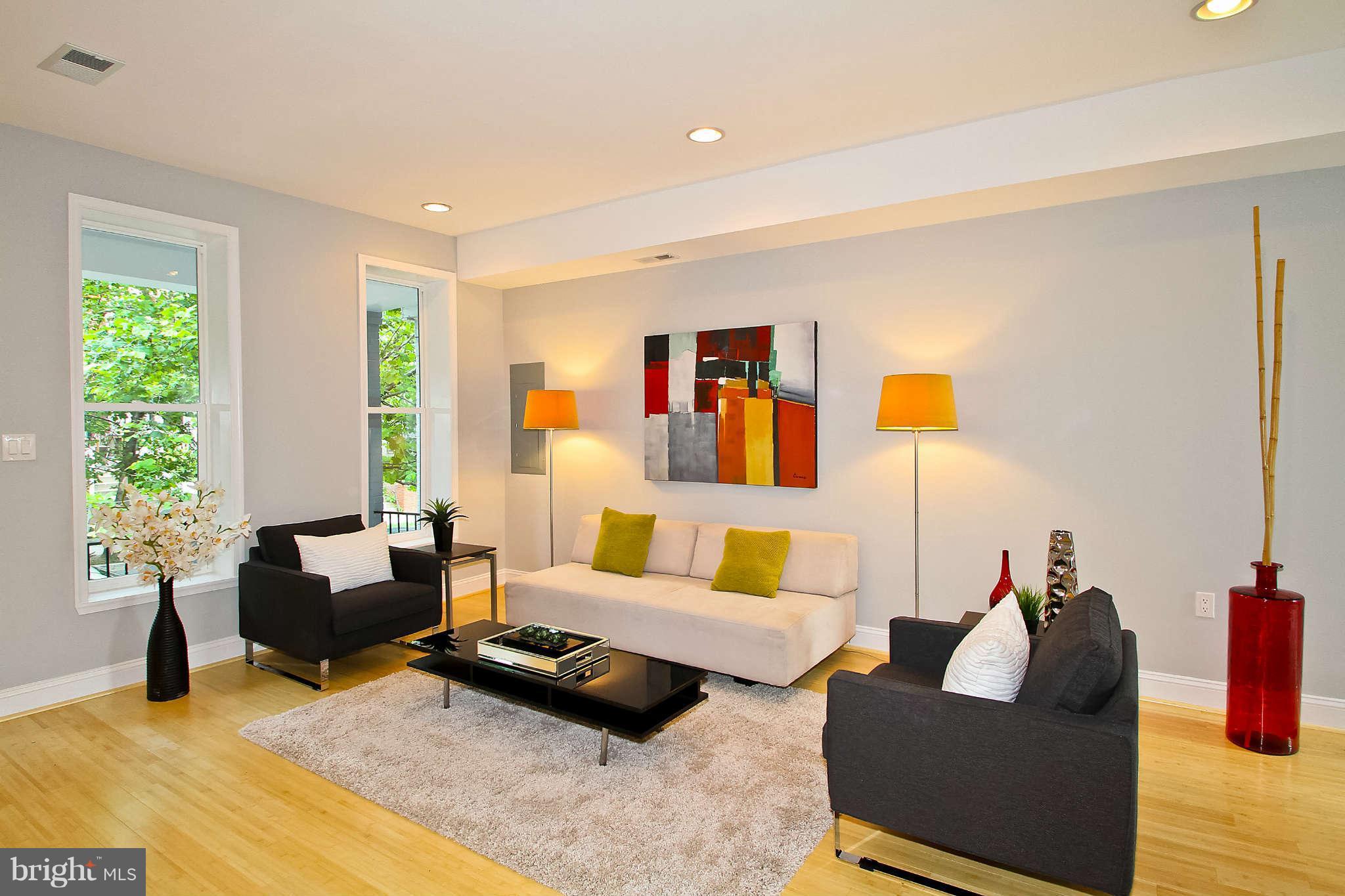 604 Columbia Road Northwest Washington, DC 20001 - Photo 3 of 25 a living room with furniture rug and window