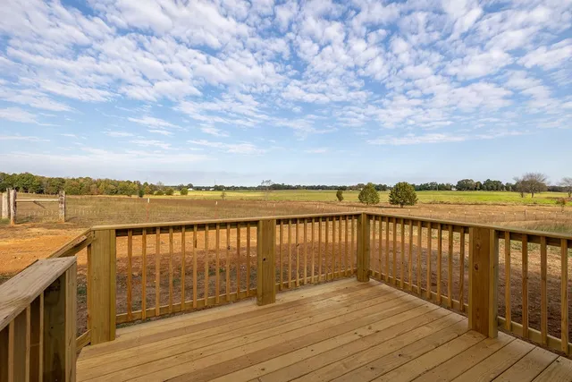 a view of wooden floor with a lake