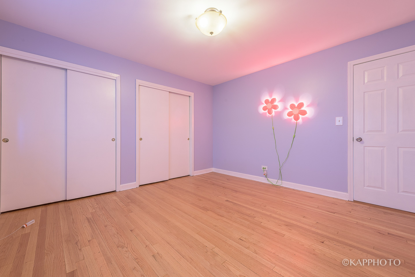 5942 West Addison Street, Unit 1 Chicago, IL 60634 - Photo 16 of 24 a view of empty room with wooden floor and fan