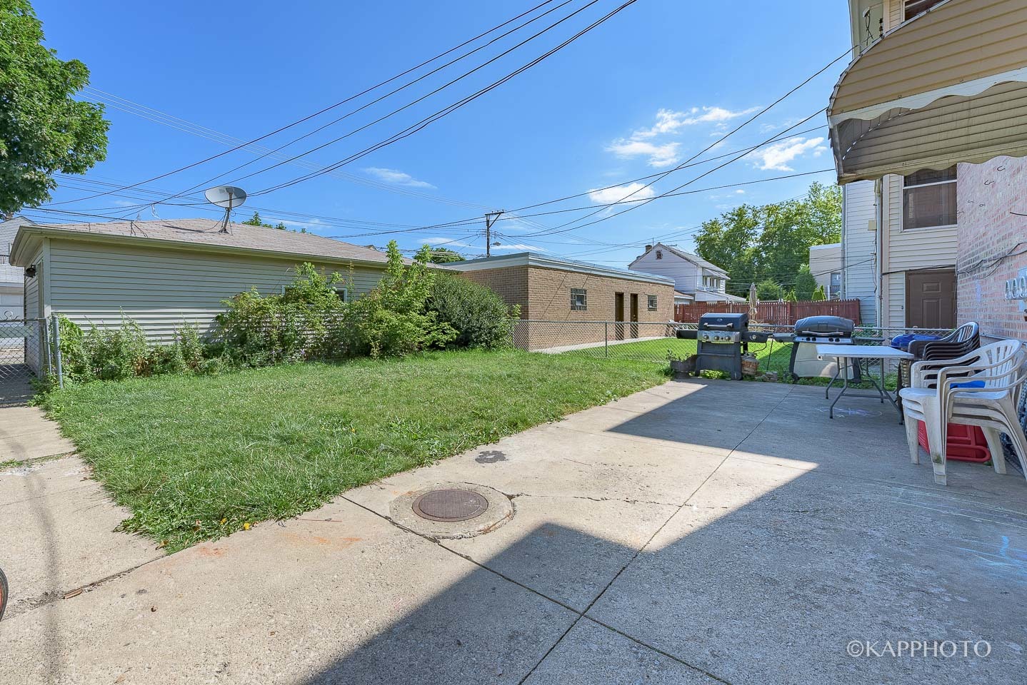 5942 West Addison Street, Unit 1 Chicago, IL 60634 - Photo 23 of 24 a view of a backyard with sitting area