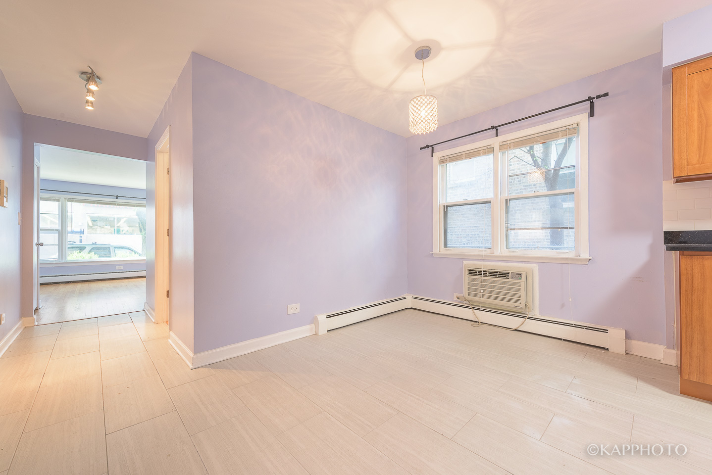 5942 West Addison Street, Unit 1 Chicago, IL 60634 - Photo 7 of 24 a view of an empty room with a window