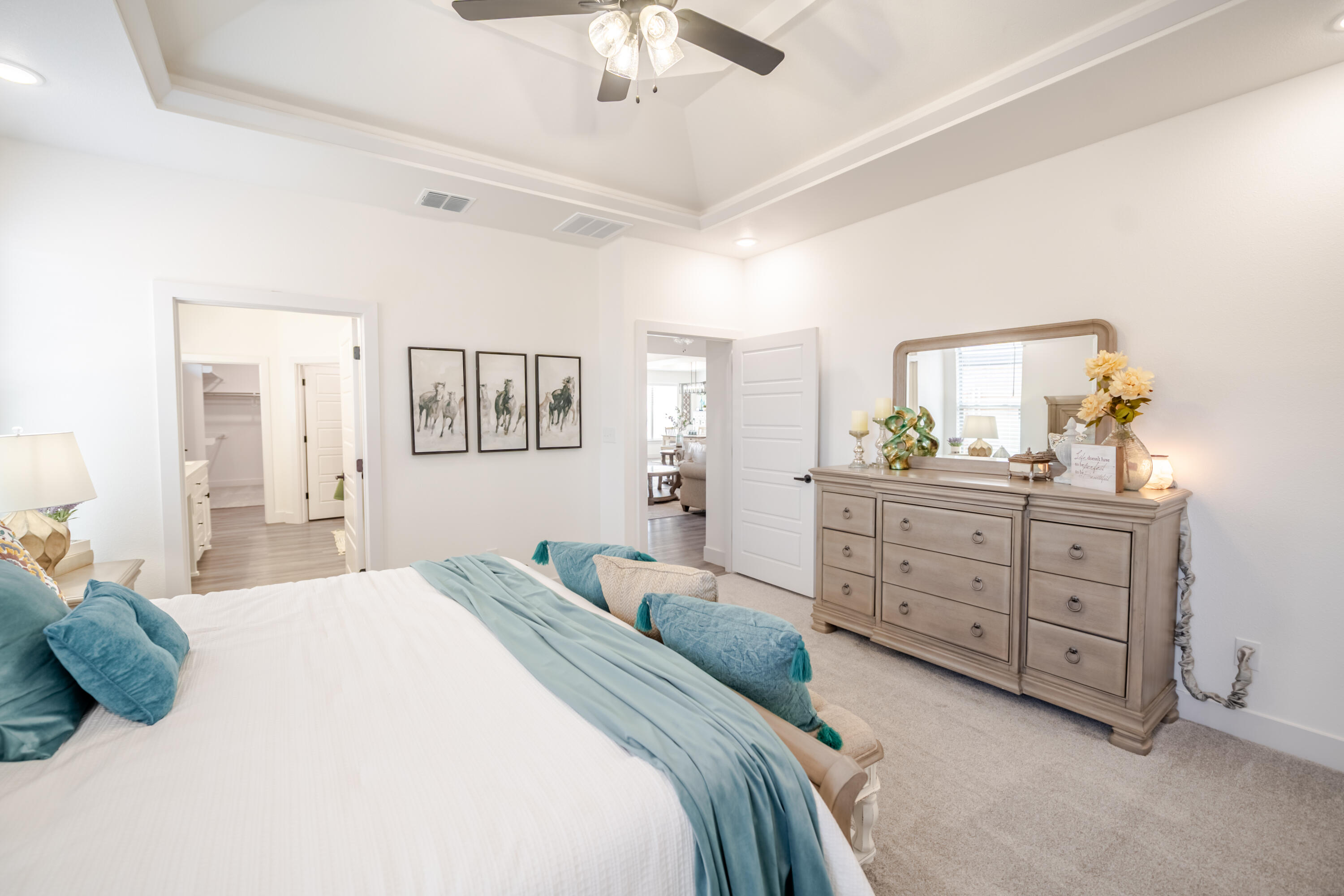 7604 58th Street Lubbock, TX 79407 - Photo 13 of 38 a bedroom with a bed and a dresser
