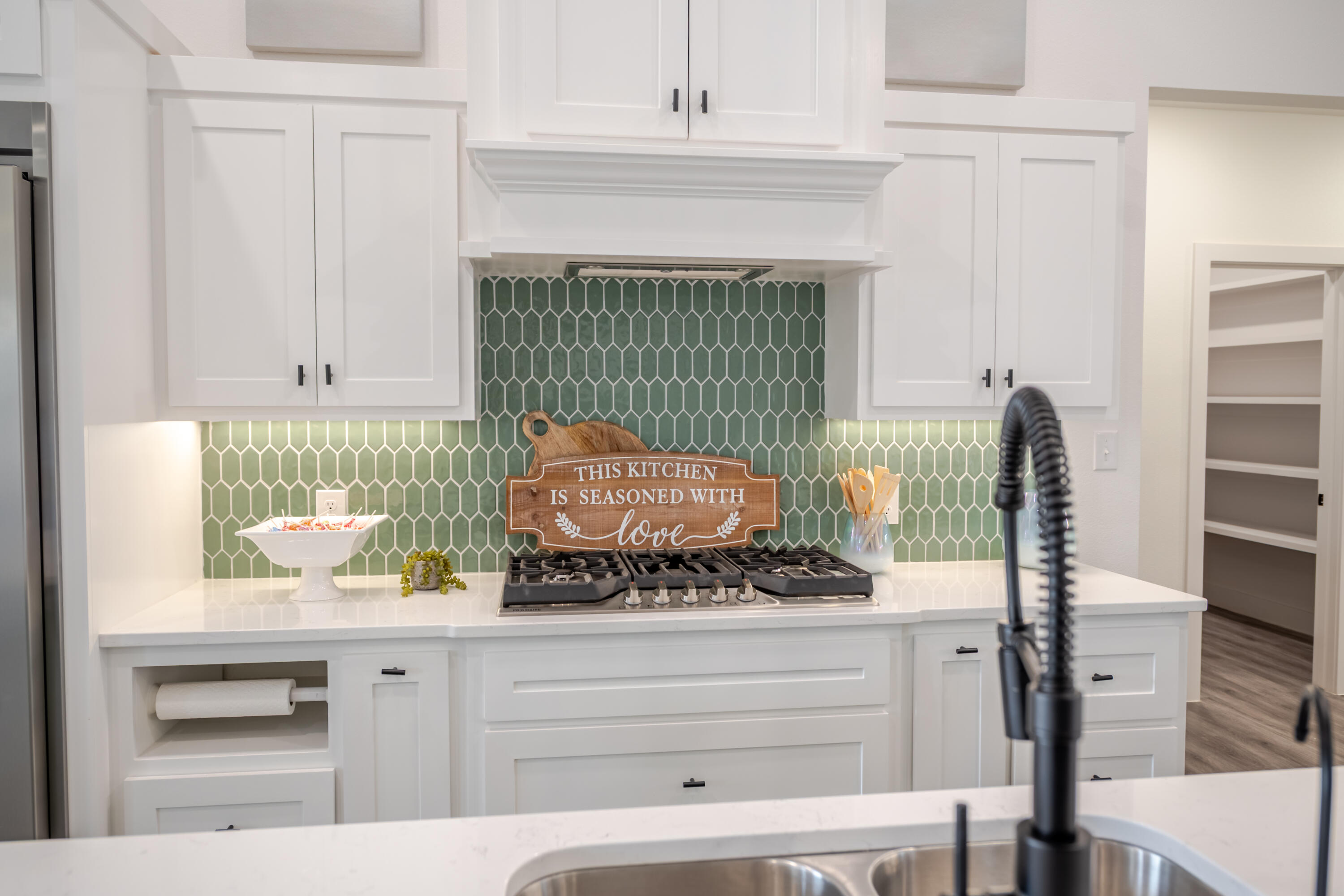 7604 58th Street Lubbock, TX 79407 - Photo 20 of 38 a bathroom with a sink and mirror