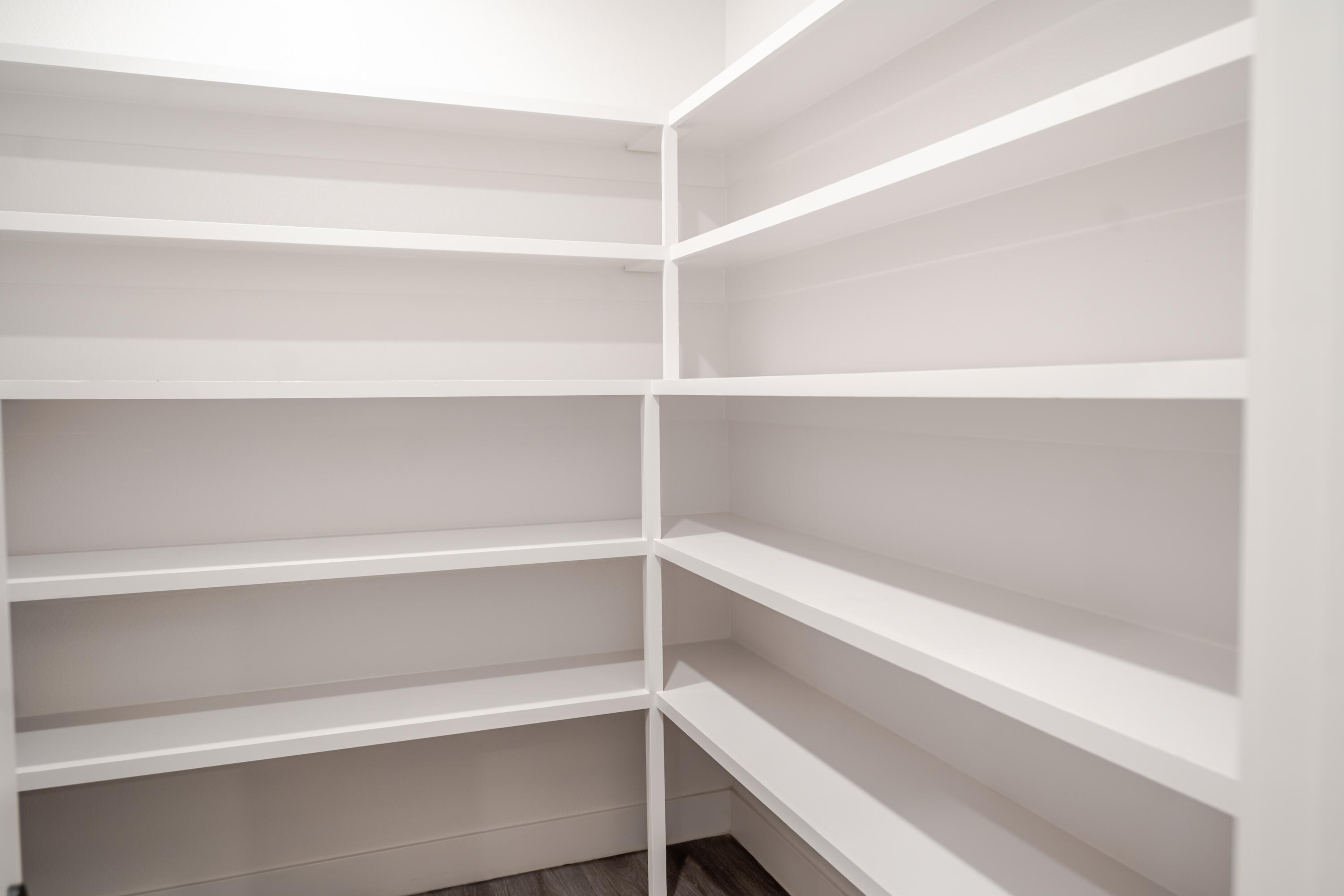 7604 58th Street Lubbock, TX 79407 - Photo 22 of 38 a view of a room with shelf