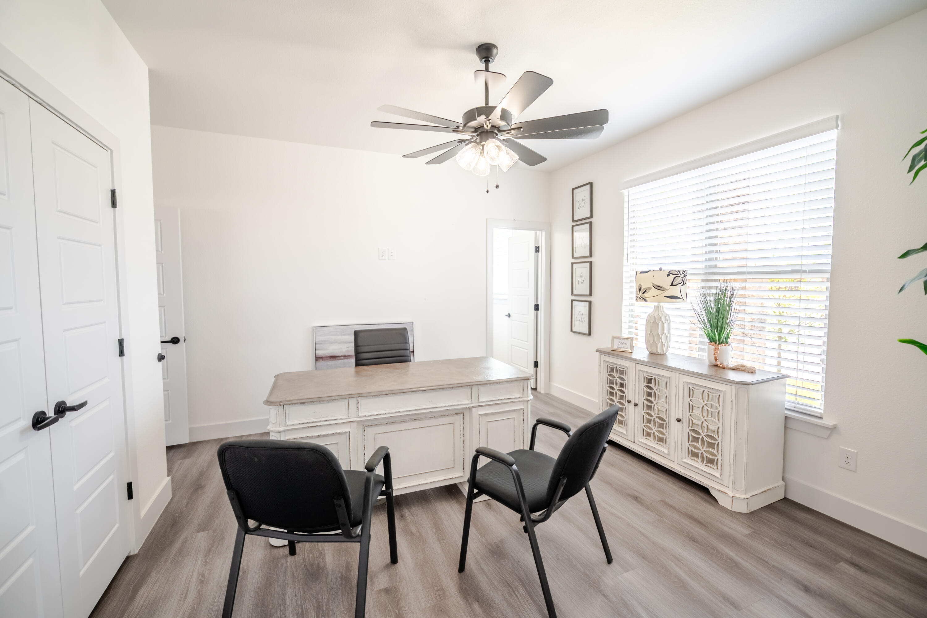 7604 58th Street Lubbock, TX 79407 - Photo 35 of 38 a view of a dining room with furniture and a window