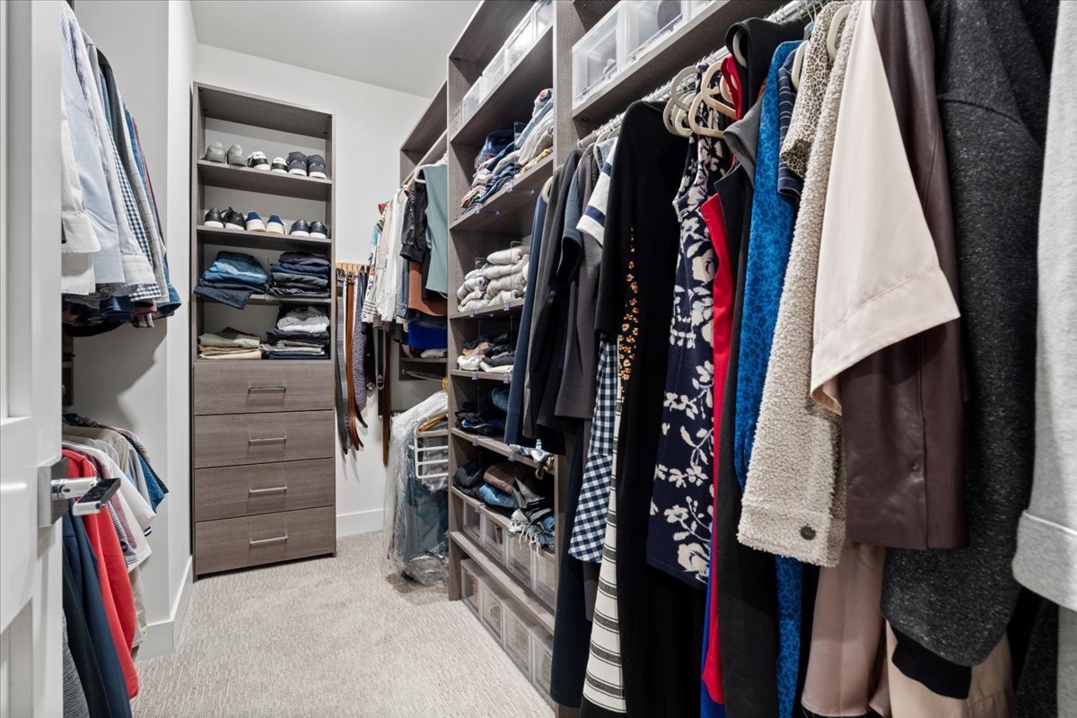 2005 West Huron Street, Unit 1 Chicago, IL 60612 - Photo 19 of 30 a view of walk in closet with clothes and shoes