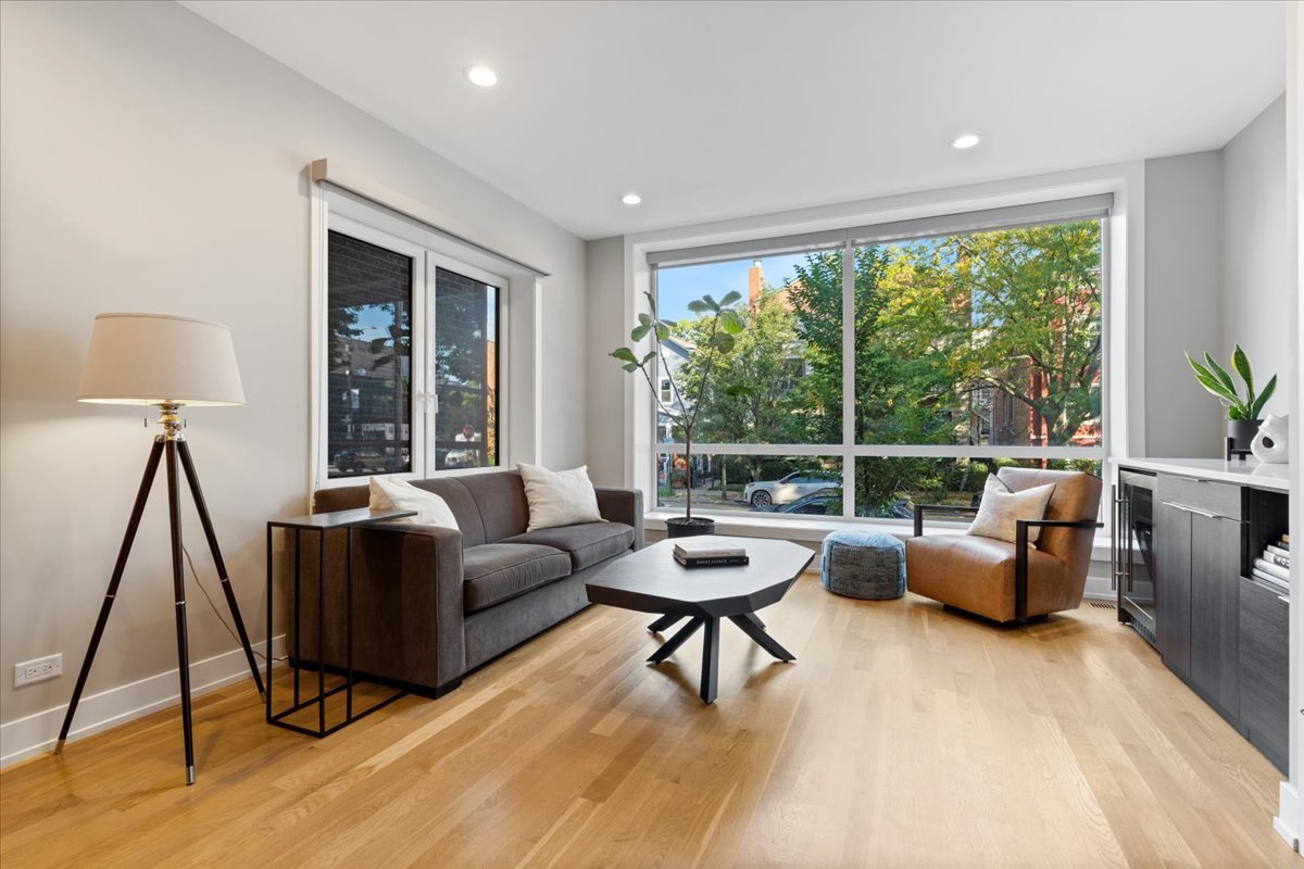 2005 West Huron Street, Unit 1 Chicago, IL 60612 - Photo 2 of 30 a living room with furniture and a large window