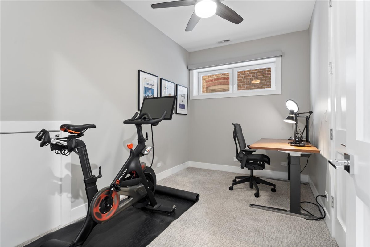 2005 West Huron Street, Unit 1 Chicago, IL 60612 - Photo 22 of 30 a view of a workspace with gym equipment