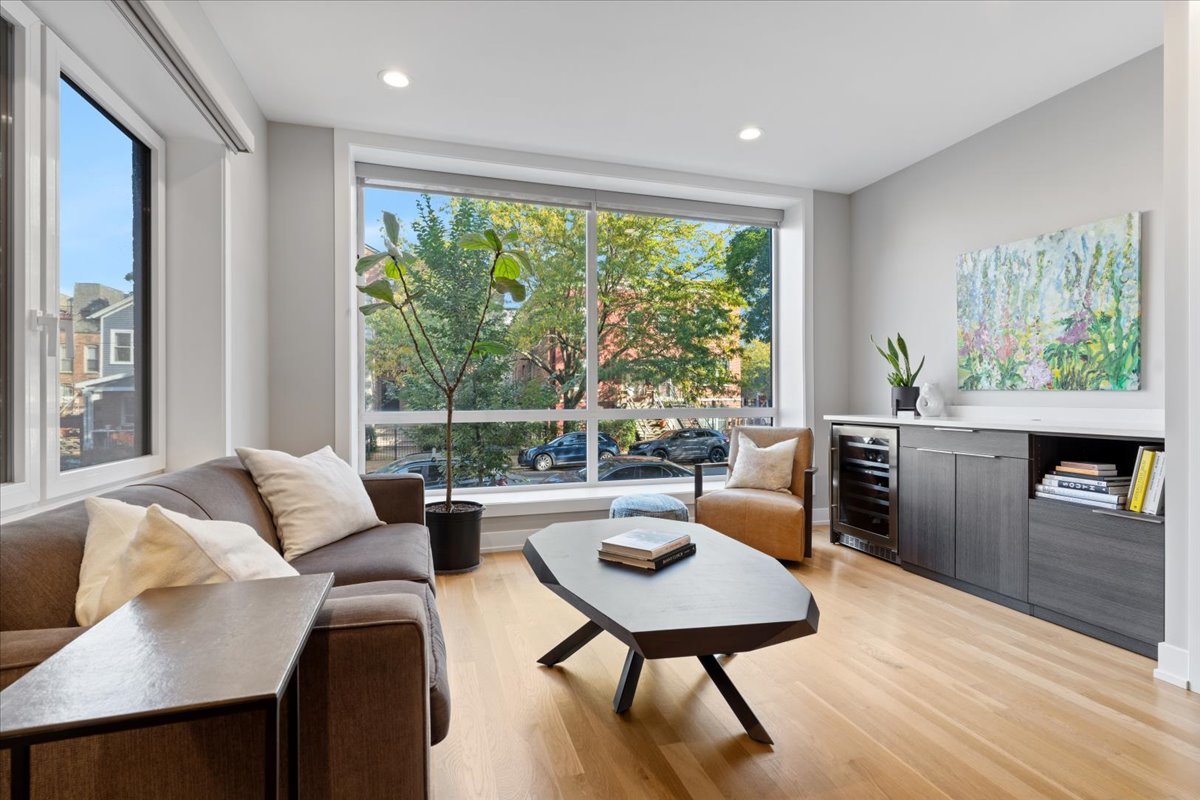 2005 West Huron Street, Unit 1 Chicago, IL 60612 - Photo 3 of 30 a living room with furniture and a large window