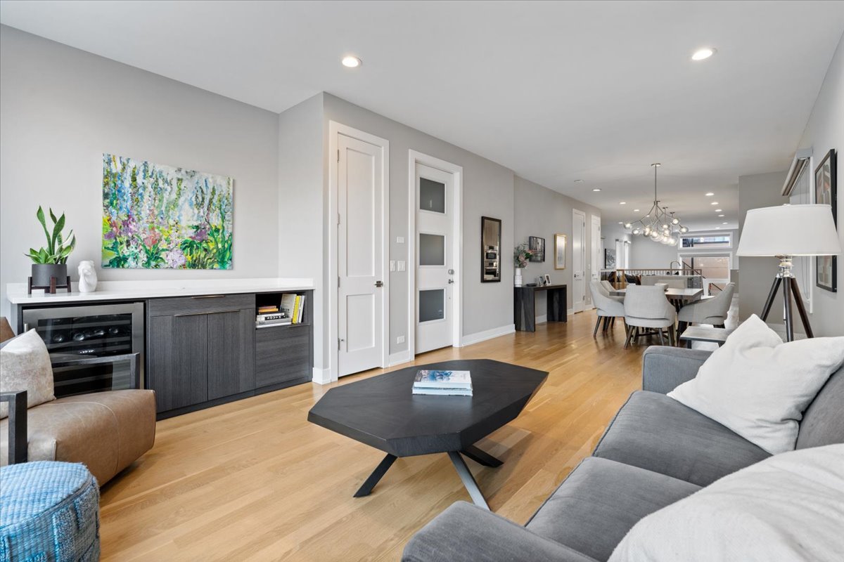 2005 West Huron Street, Unit 1 Chicago, IL 60612 - Photo 4 of 30 a living room with furniture and a flat screen tv