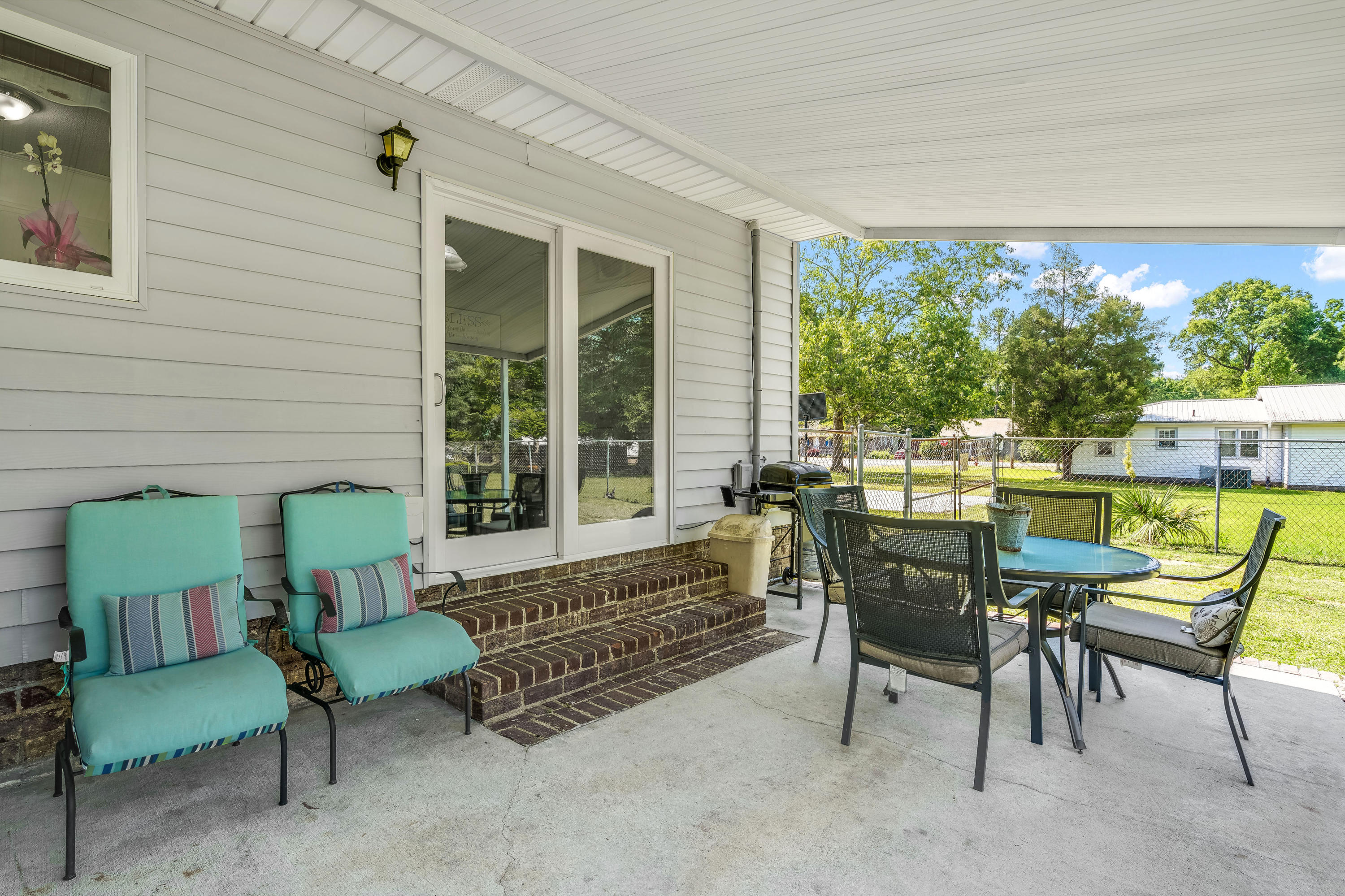 103 O'Carroll Street Moncks Corner, SC 29461 - Photo 24 of 25 covered patio!