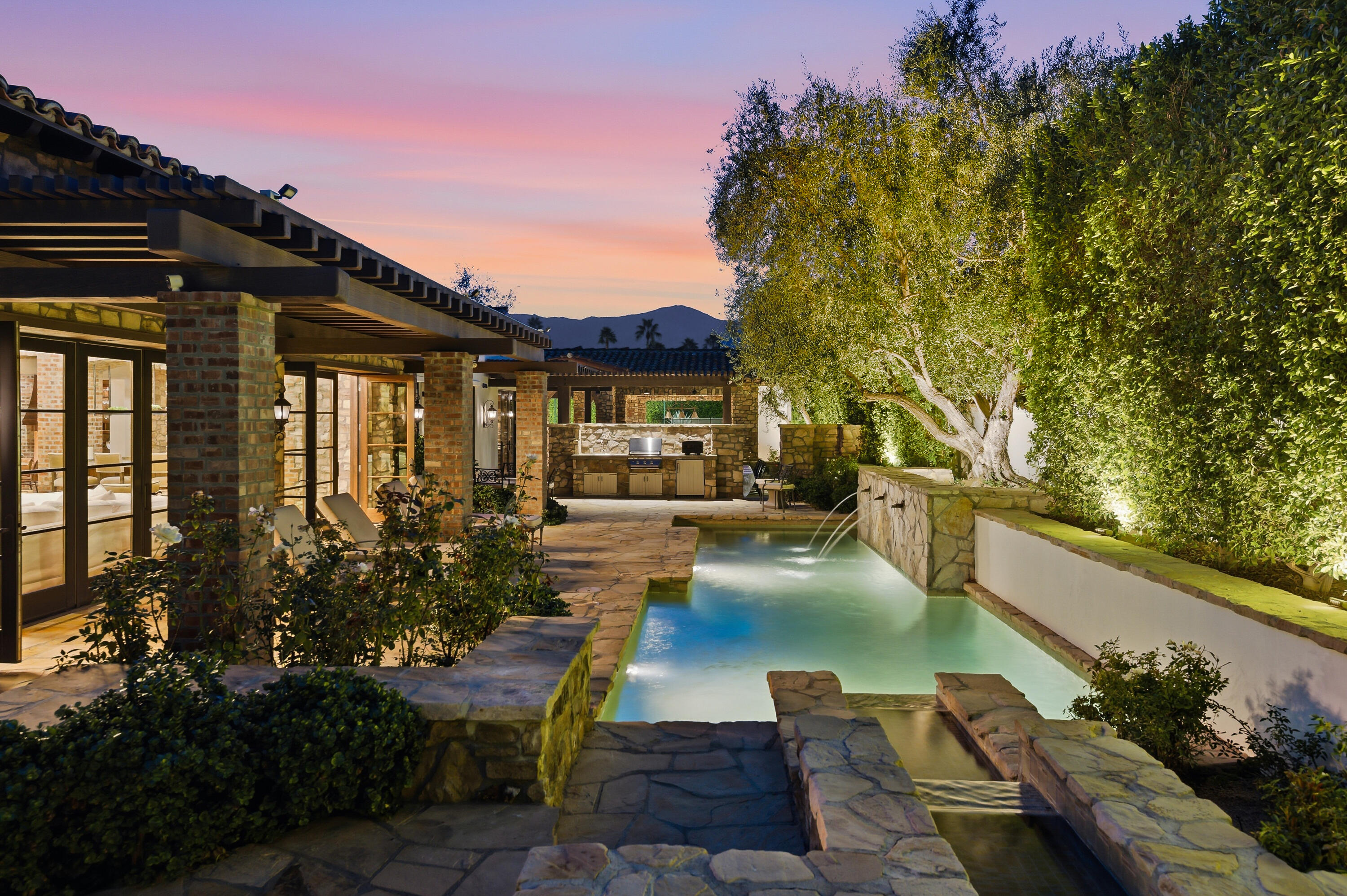 4 Via L' Antico Rancho Mirage, CA 92270 - Photo 11 of 75 a view of swimming pool with outdoor seating and plants