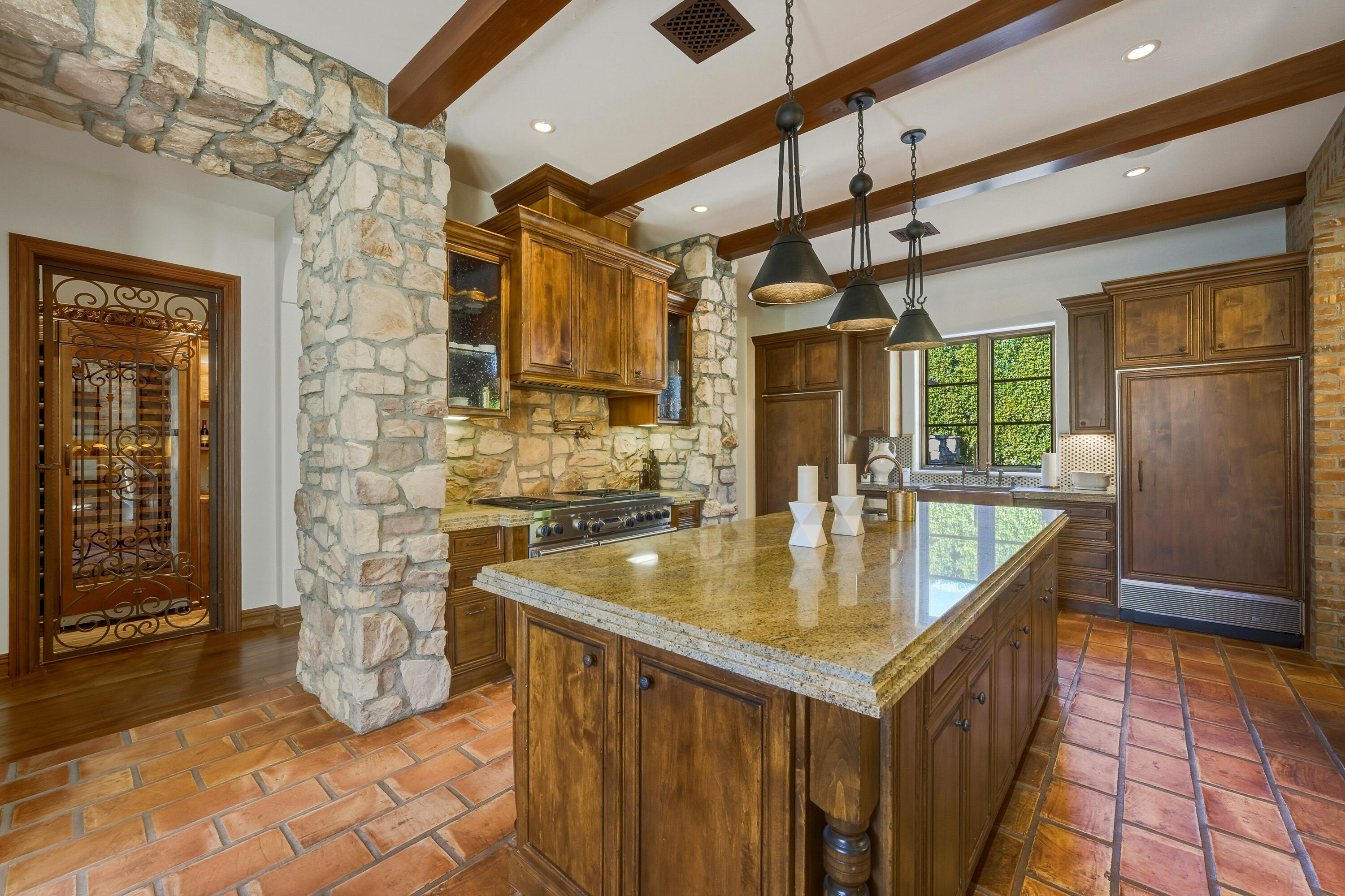 4 Via L' Antico Rancho Mirage, CA 92270 - Photo 21 of 75 a kitchen with a sink a counter top space and cabinets