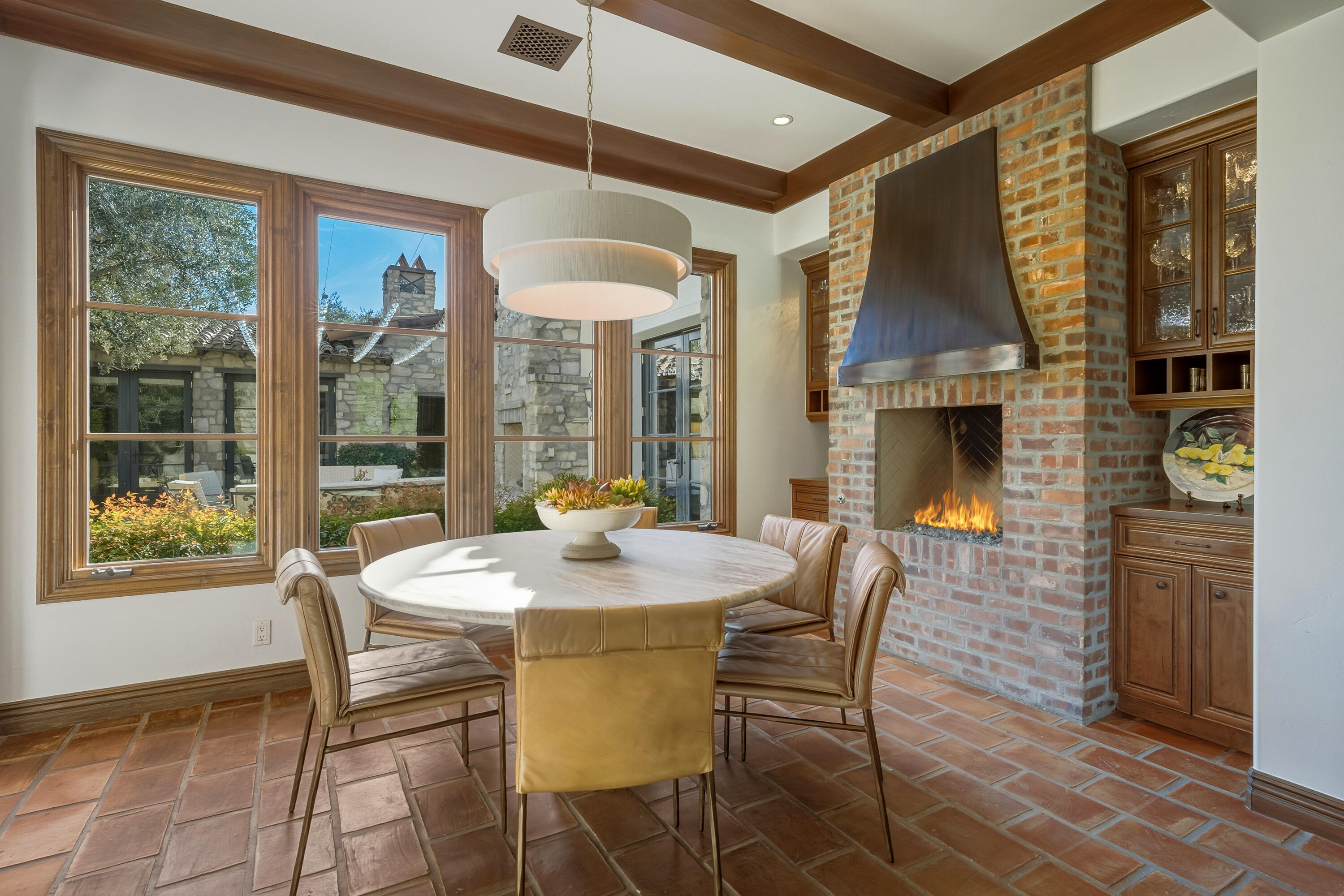 4 Via L' Antico Rancho Mirage, CA 92270 - Photo 23 of 75 a view of a dining room with furniture window and outside view