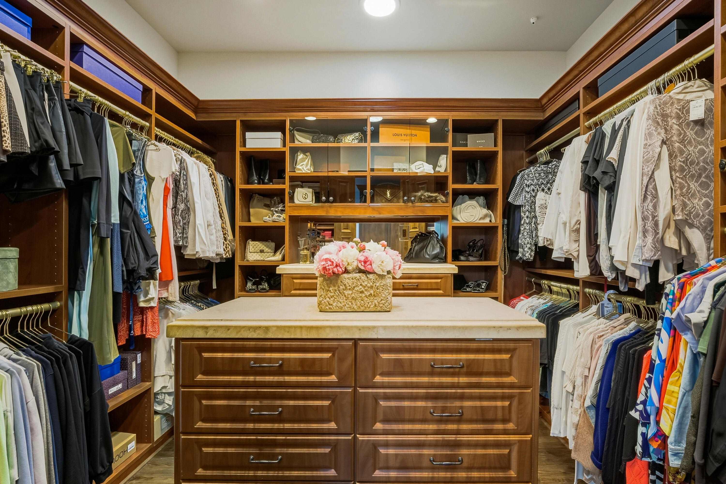 4 Via L' Antico Rancho Mirage, CA 92270 - Photo 31 of 75 a view of walk in closet with clothes and shoes