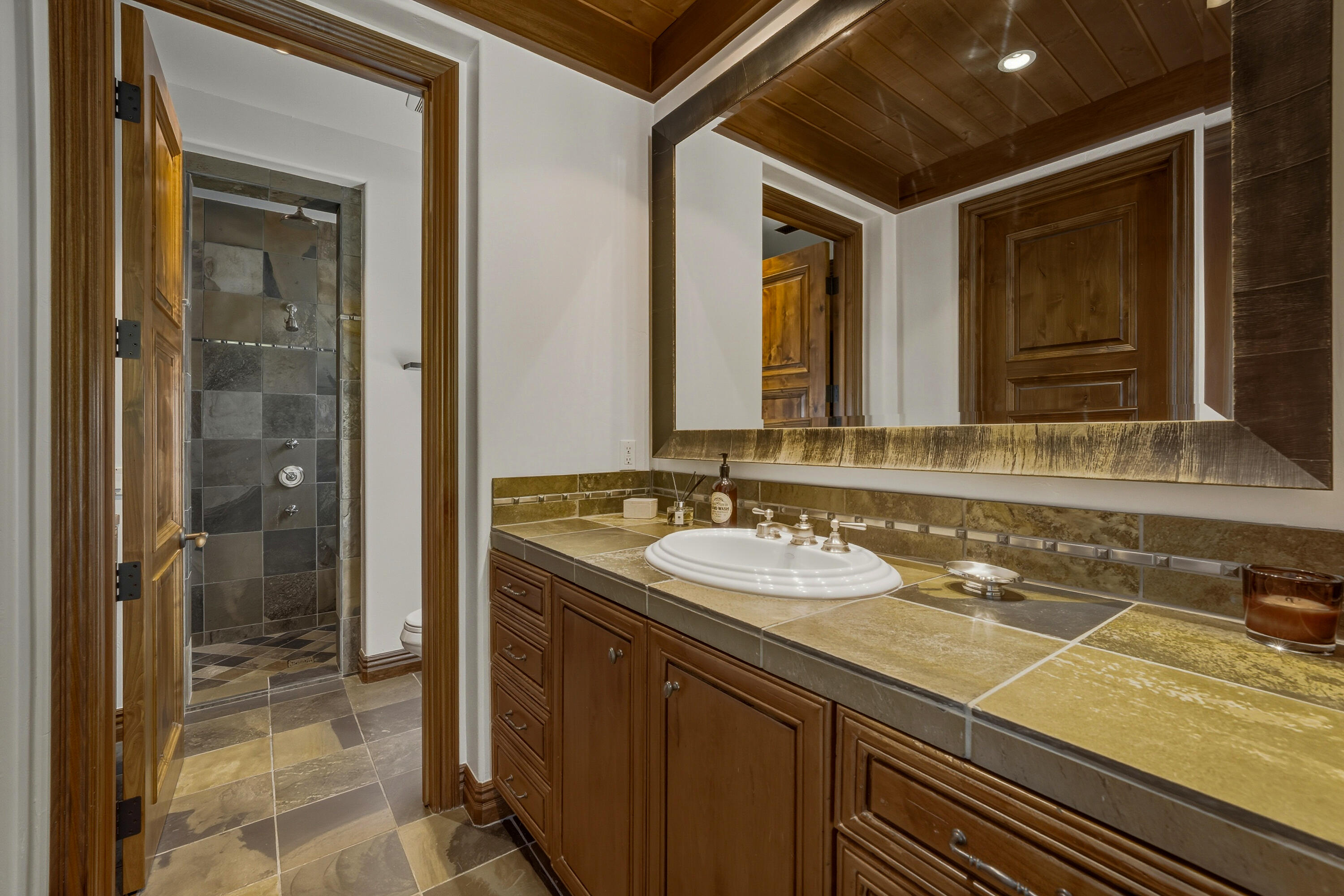 4 Via L' Antico Rancho Mirage, CA 92270 - Photo 36 of 75 a bathroom with a sink and a mirror