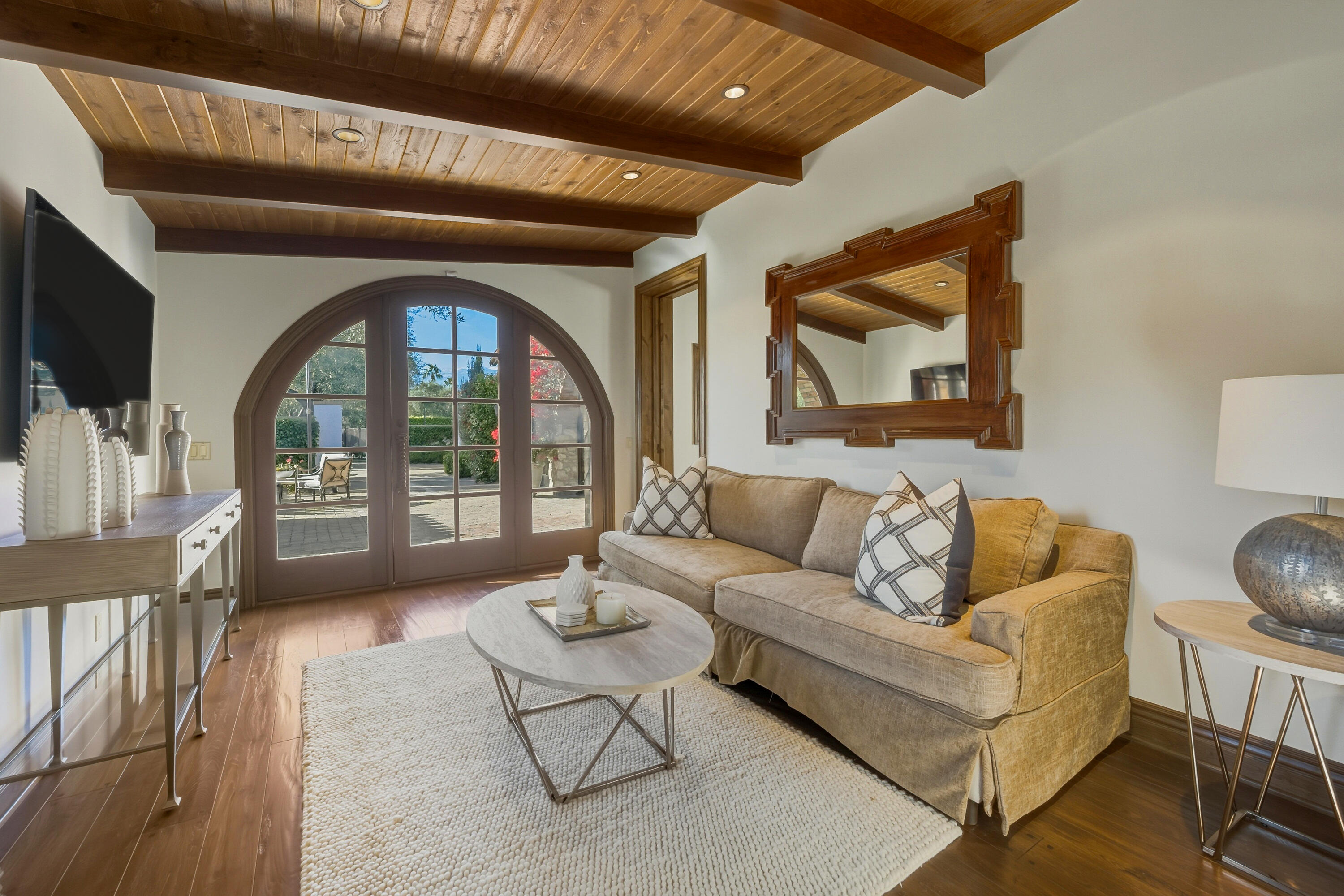 4 Via L' Antico Rancho Mirage, CA 92270 - Photo 43 of 75 a living room with furniture and a large window