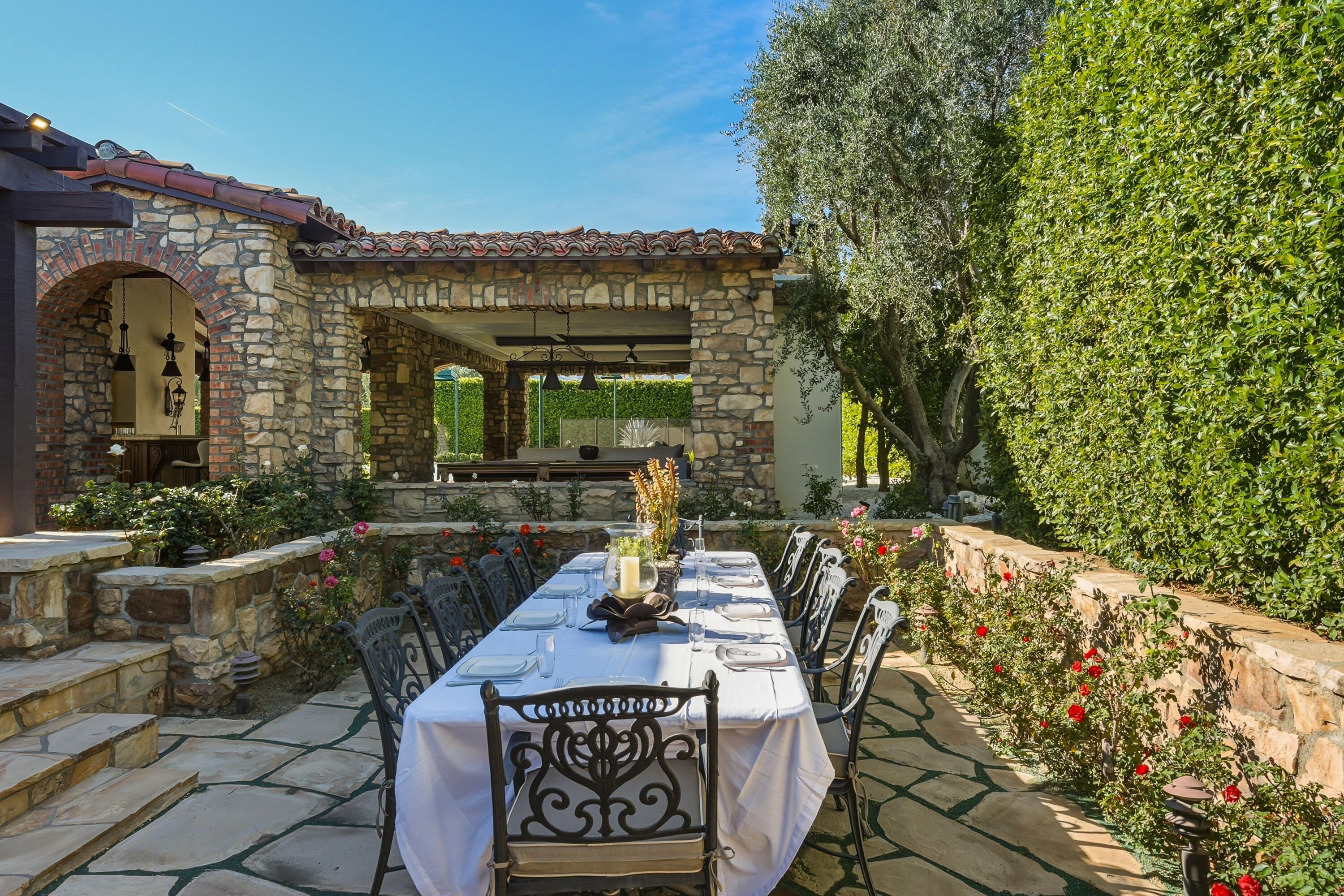 4 Via L' Antico Rancho Mirage, CA 92270 - Photo 51 of 75 a view of a house with backyard and sitting area