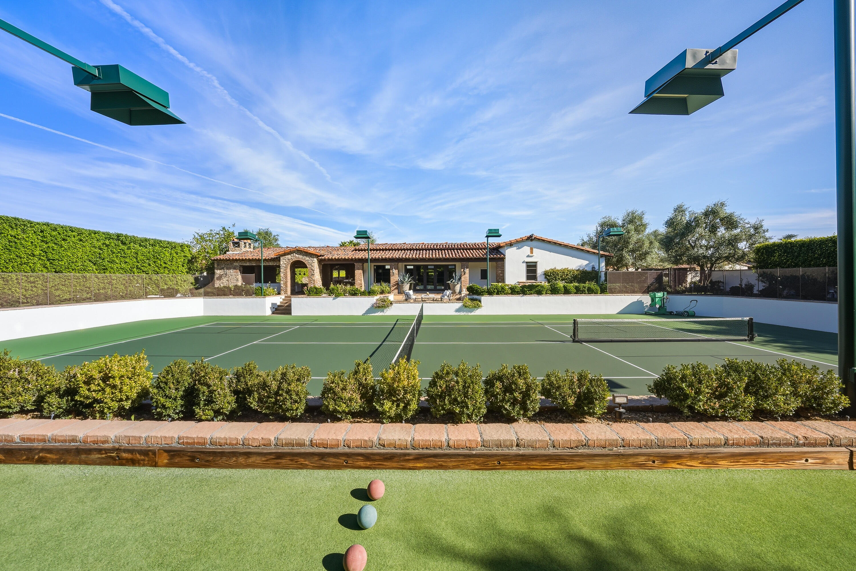 4 Via L' Antico Rancho Mirage, CA 92270 - Photo 65 of 75 a view of a big house with a big yard