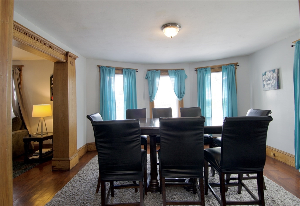16 Amity Court Springfield, MA 01108 - Photo 13 of 42 a view of a a dining room with furniture and a window