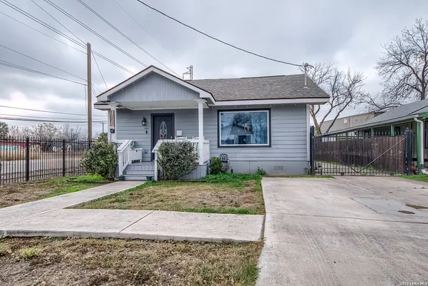 a backyard of a house with seating space