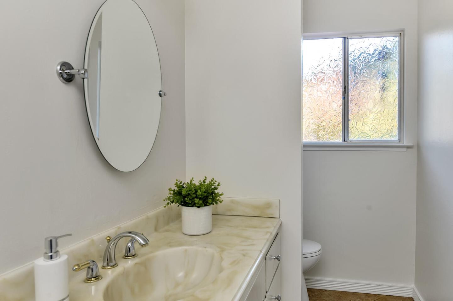 5 Morse Lane Woodside, CA 94062 - Photo 19 of 30 a bathroom with a sink a toilet and a mirror