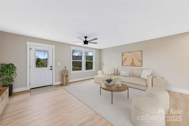 a kitchen with kitchen island stainless steel appliances a sink cabinets and counter top space