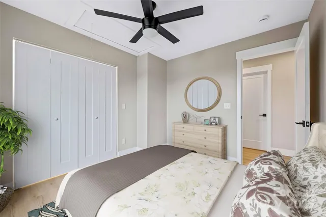 a view of a room with wooden floor