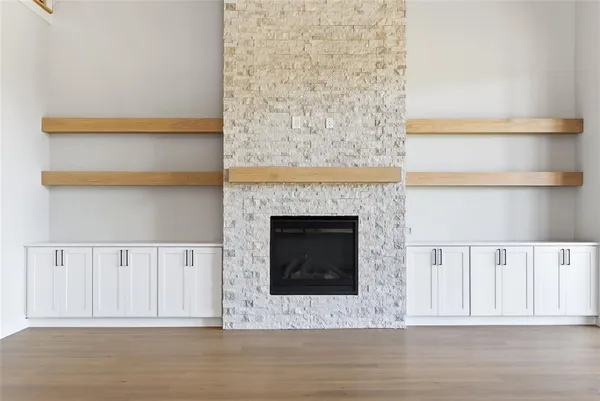 a view of a livingroom with wooden floor