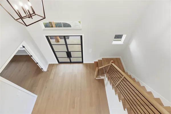 a view of wooden floor in an empty room