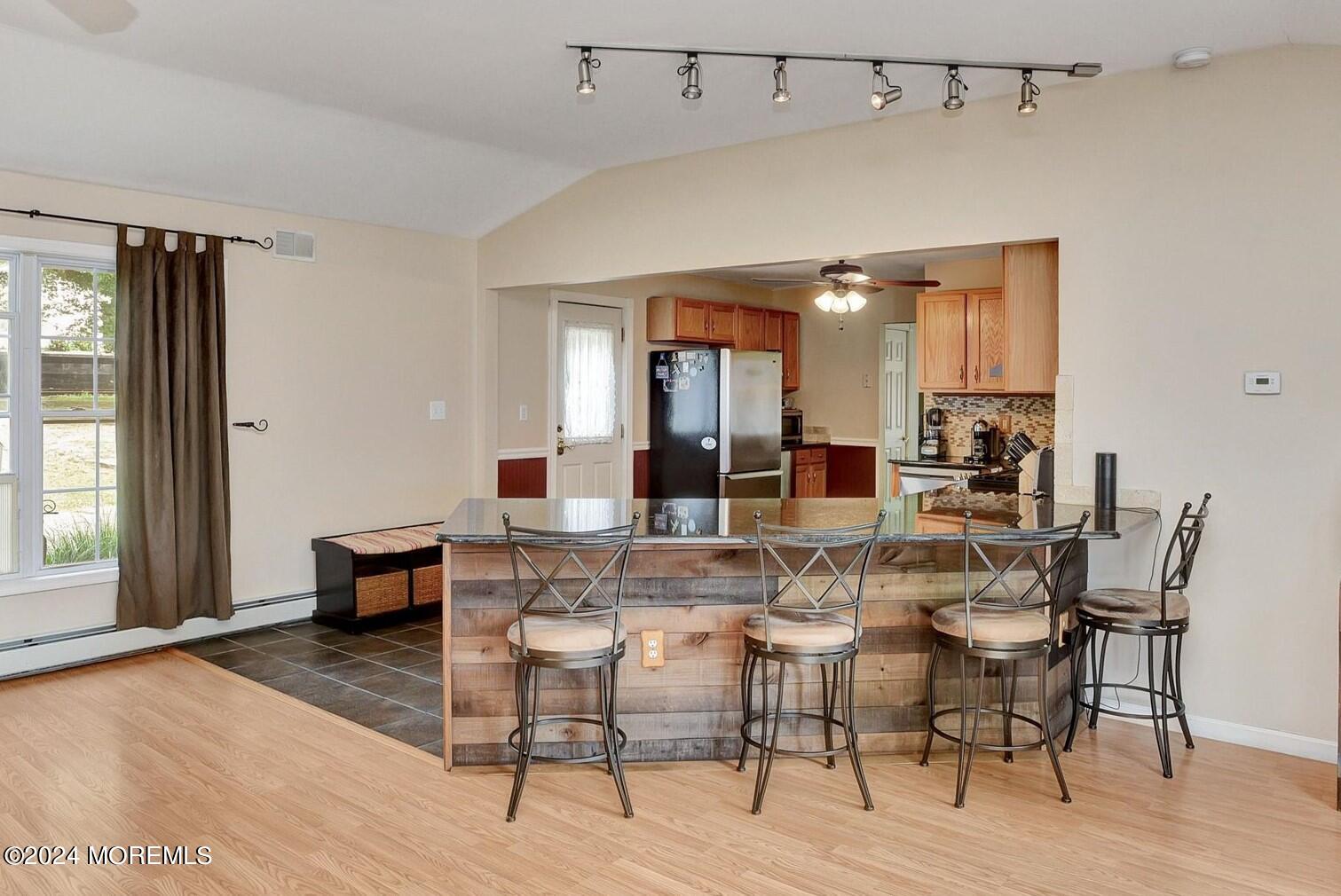155 Tyrpak Road Howell, NJ 07731 - Photo 11 of 35 a view of a dining room with furniture and wooden floor
