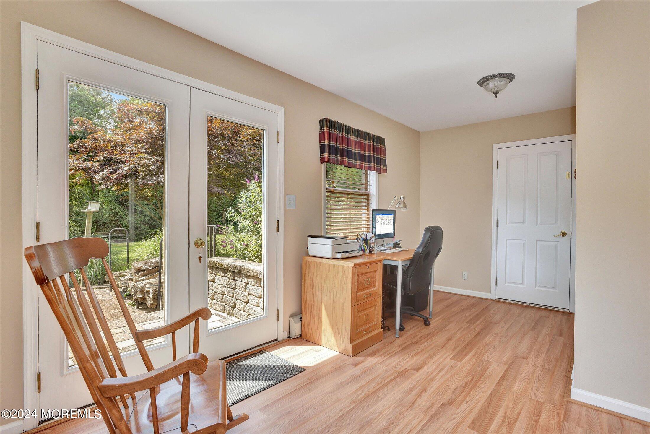 155 Tyrpak Road Howell, NJ 07731 - Photo 16 of 35 a view of a dining room with furniture window and wooden floor