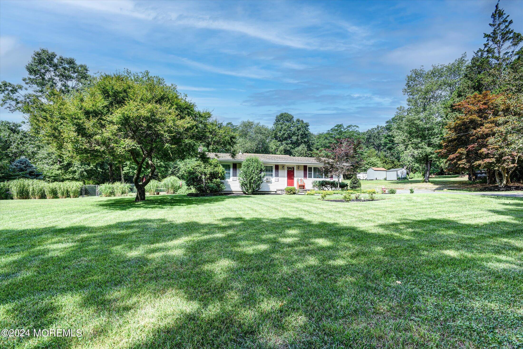 155 Tyrpak Road Howell, NJ 07731 - Photo 3 of 35 a view of a house with a big yard
