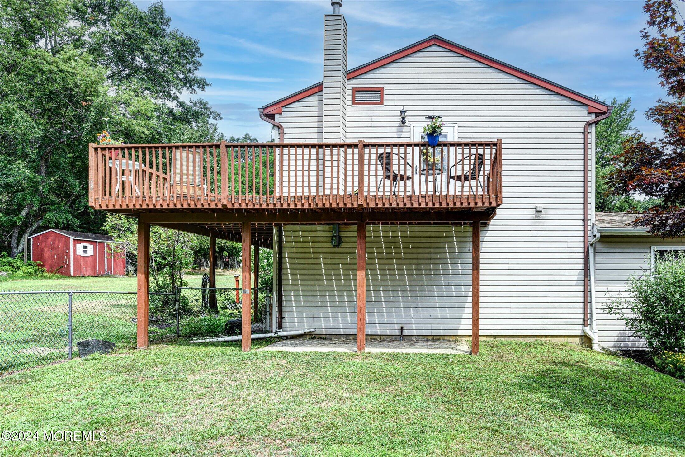 155 Tyrpak Road Howell, NJ 07731 - Photo 32 of 35 a front view of a house with garage