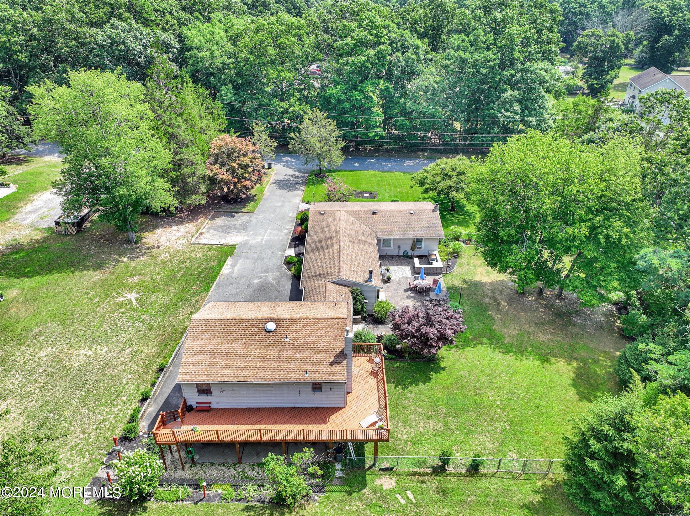 155 Tyrpak Road Howell, NJ 07731 - Photo 34 of 35 an aerial view of a house with a yard