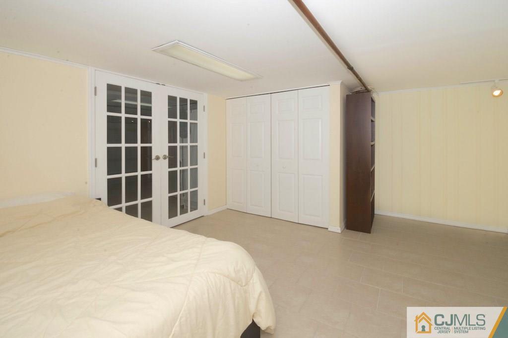 96 Smith Road Somerset, NJ 08873 - Photo 22 of 25 a bedroom with a bed and a window