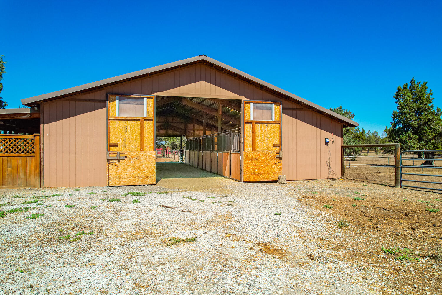 2218 Southwest 79th Street Redmond, OR 97756 - Photo 25 of 54 a front view of a house with a yard