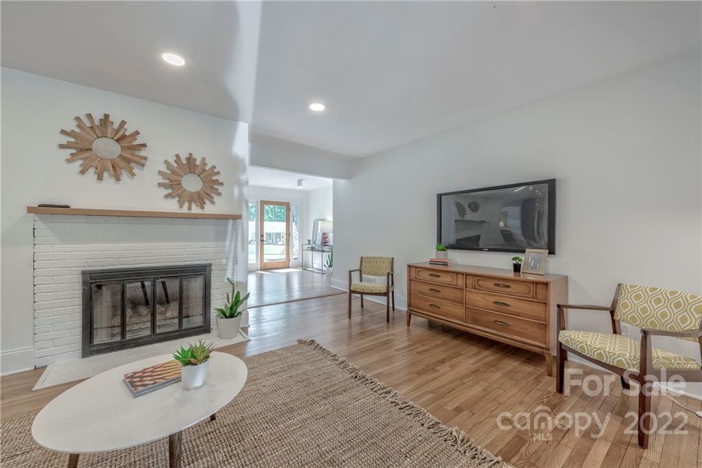 1139 Shady Bluff Drive Charlotte, NC 28211 - Photo 13 of 46 a living room with furniture and a fireplace