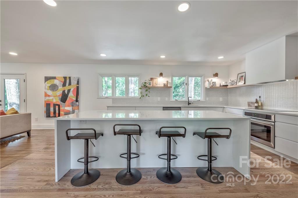 1139 Shady Bluff Drive Charlotte, NC 28211 - Photo 19 of 46 a kitchen with lots of counter top space cabinets and appliances
