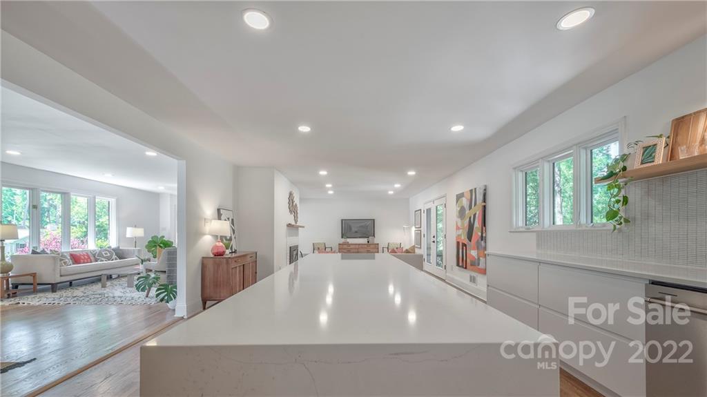 1139 Shady Bluff Drive Charlotte, NC 28211 - Photo 24 of 46 a large room with wooden floor and windows