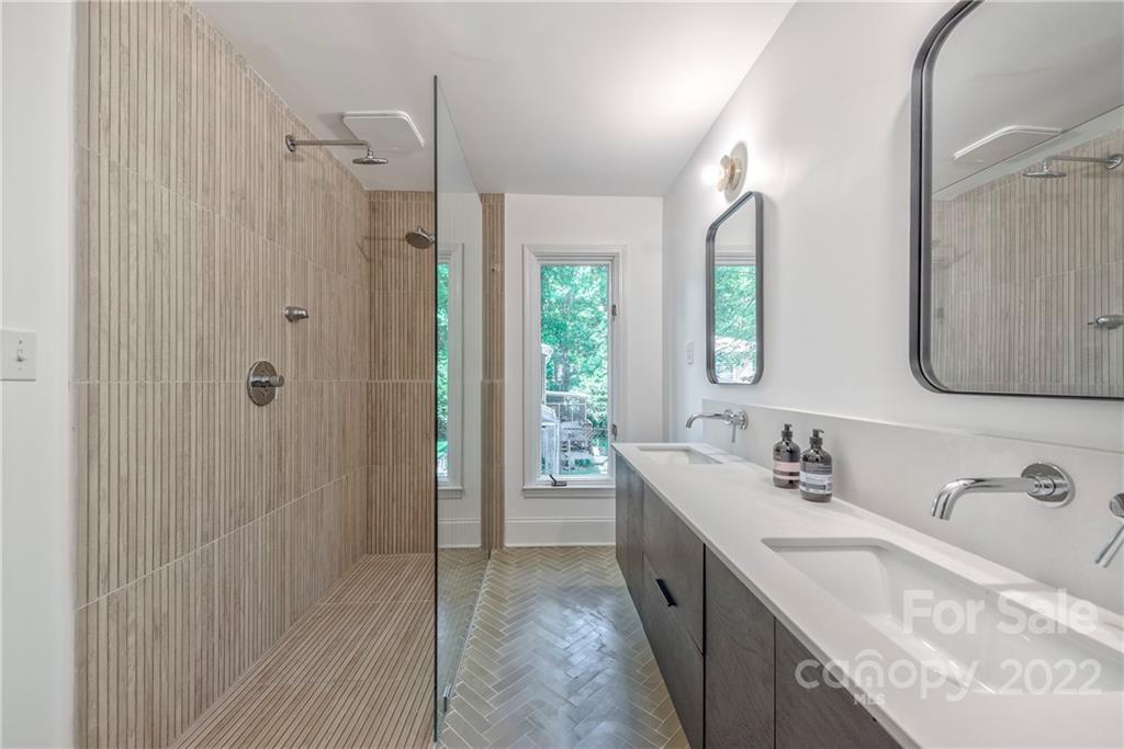 1139 Shady Bluff Drive Charlotte, NC 28211 - Photo 31 of 46 a bathroom with a granite countertop sink mirror and double