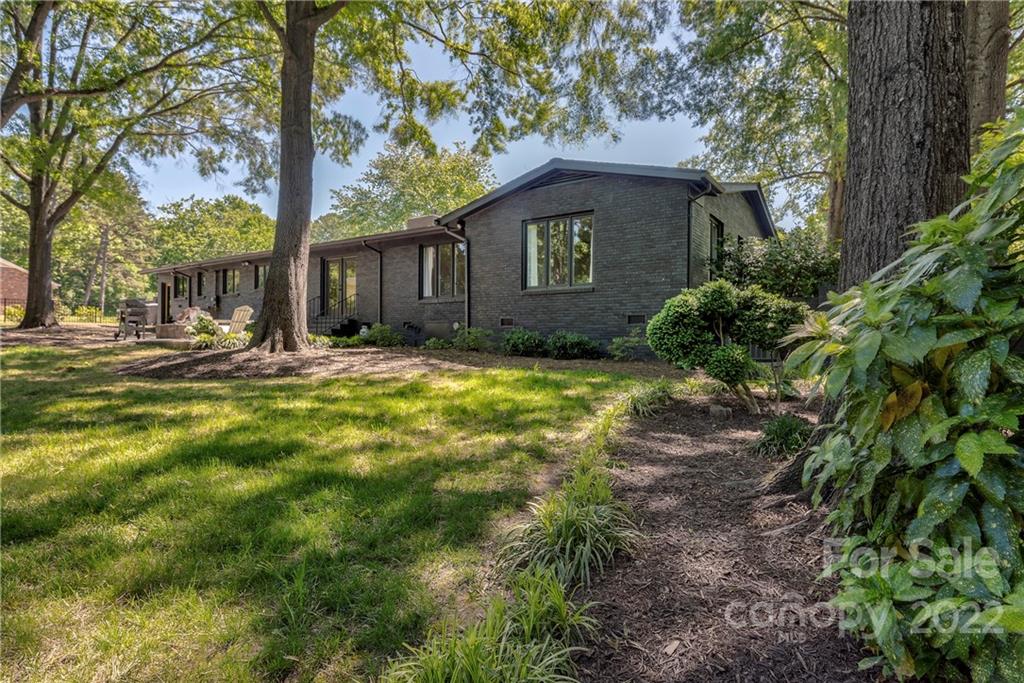 1139 Shady Bluff Drive Charlotte, NC 28211 - Photo 40 of 46 a view of a house with a yard